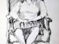 Female seated in chair